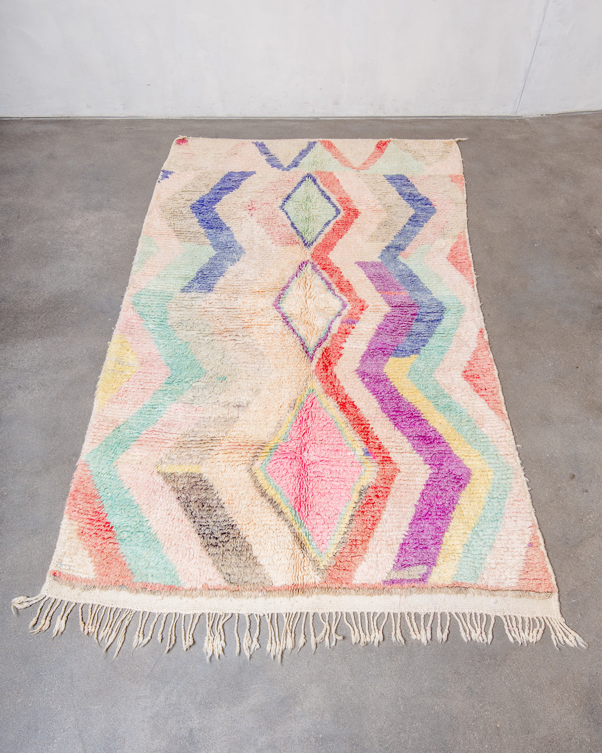 Modern, designer, handcrafted Berber rug from Morocco. Vintage carpet with beautiful colours and patterns and fluffy texture.